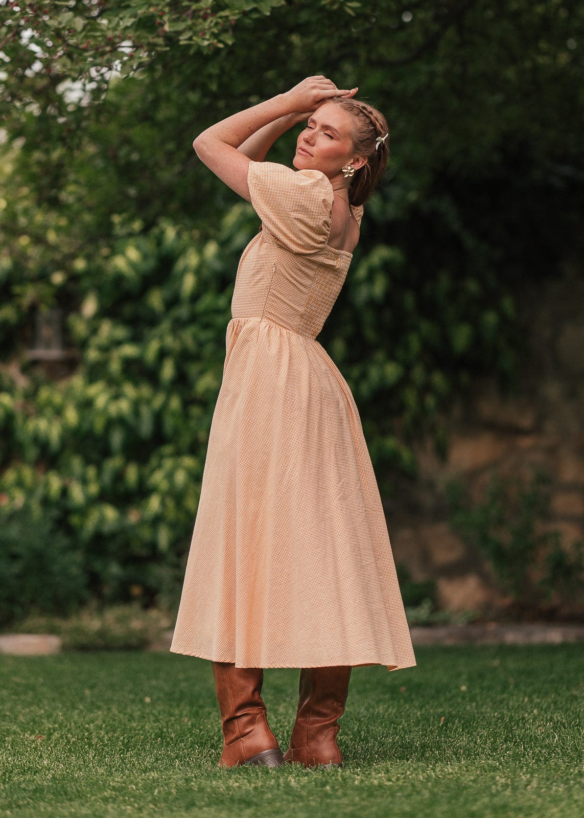 chic size inclusive model wearing JessaKae Cosette Dress