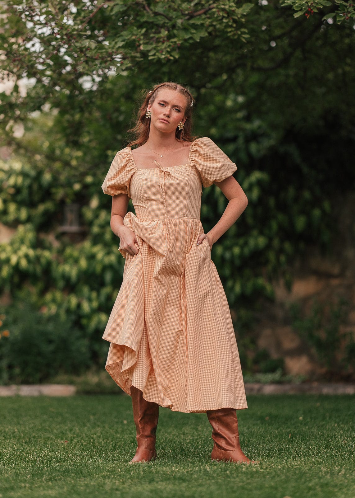 chic size inclusive model wearing JessaKae Cosette Dress