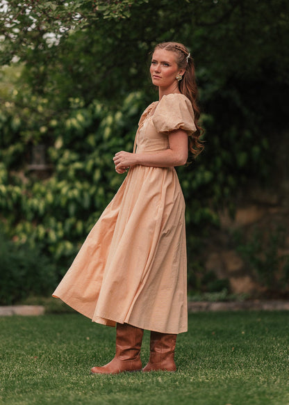 chic size inclusive model wearing JessaKae Cosette Dress