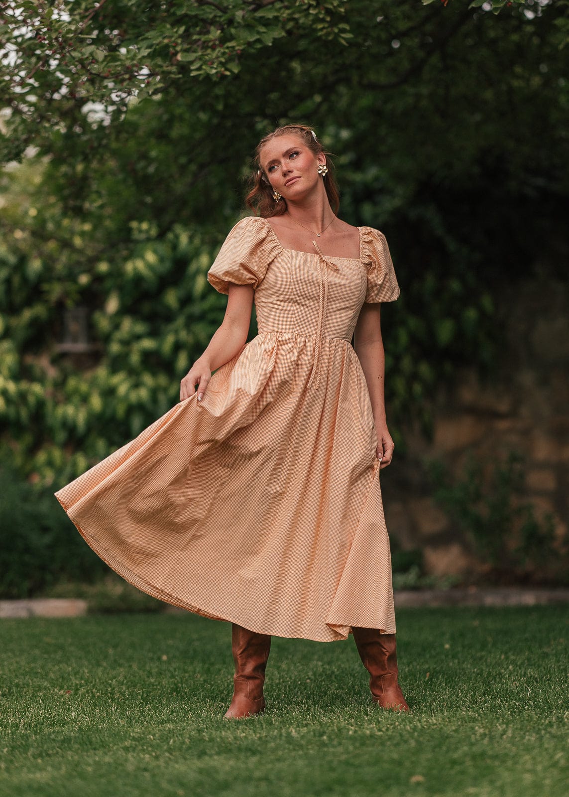 chic size inclusive model wearing JessaKae Cosette Dress