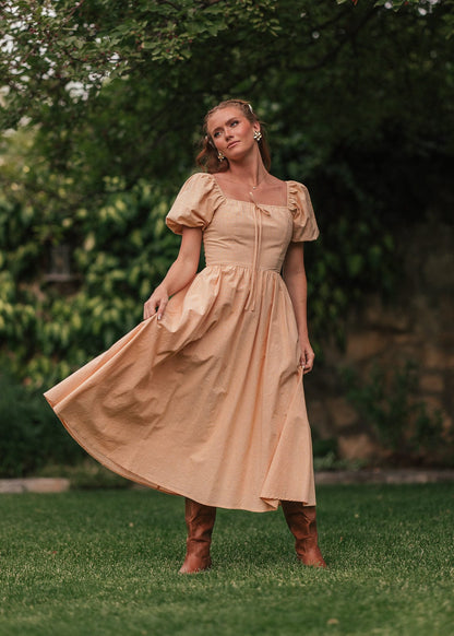 chic size inclusive model wearing JessaKae Cosette Dress