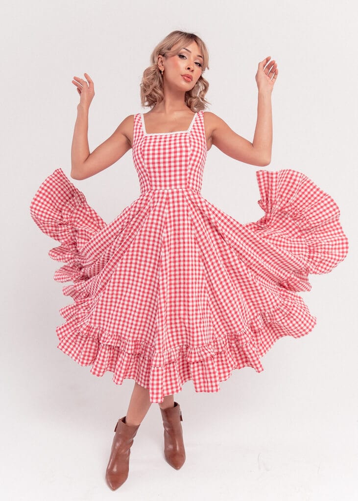 chic size inclusive model wearing JessaKae Daze Dress_Red Gingham / XS Gingham