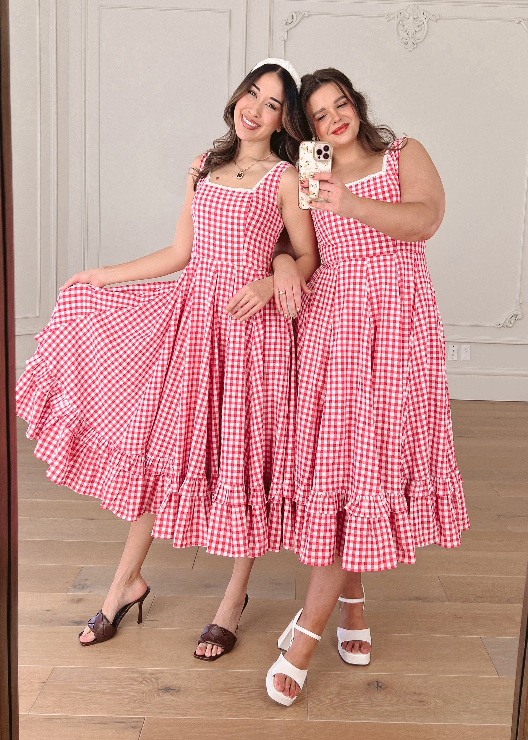 chic size inclusive model wearing JessaKae Daze Dress Red Gingham Dresses