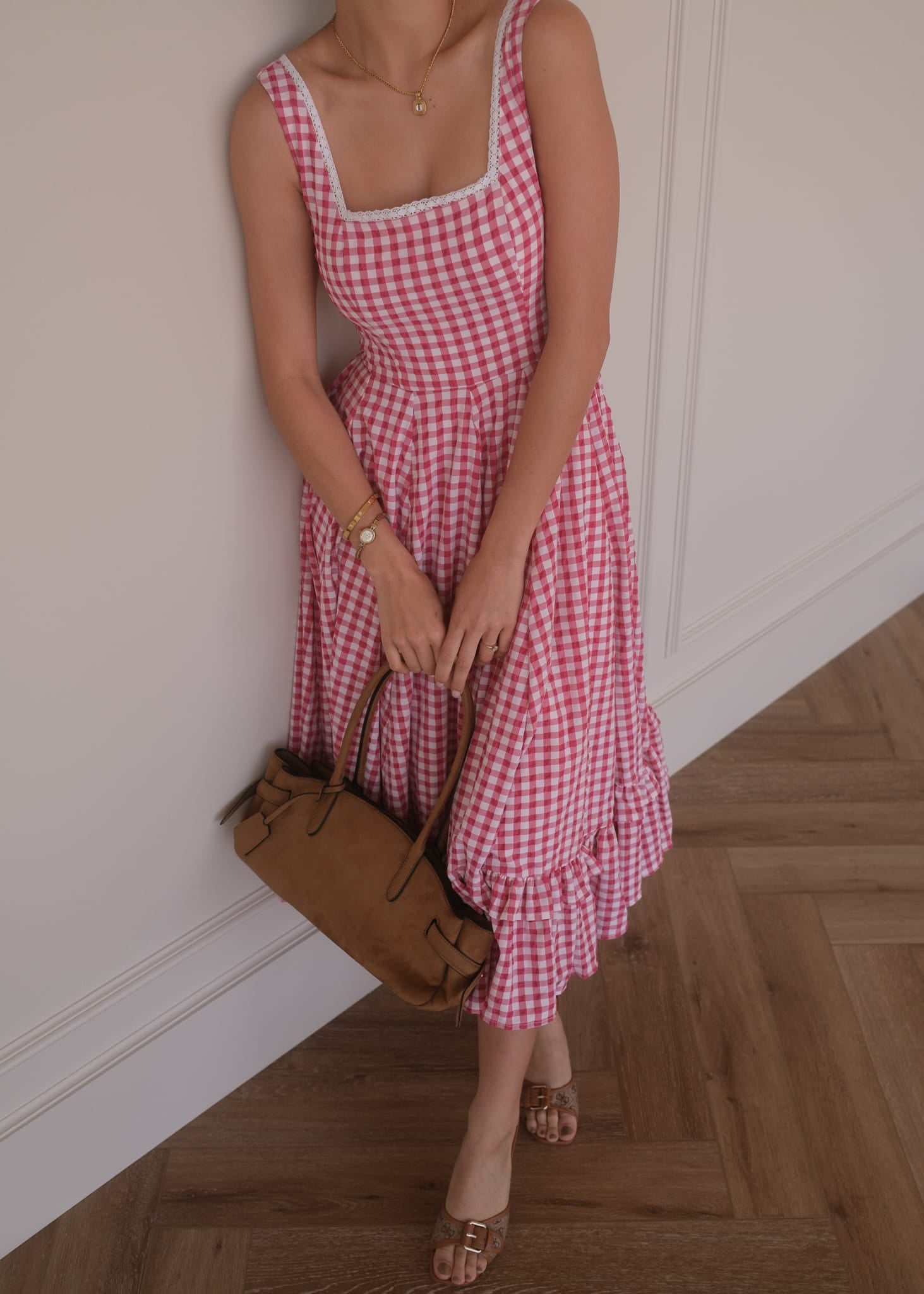 chic size inclusive model wearing JessaKae Daze Dress Red Gingham Dresses