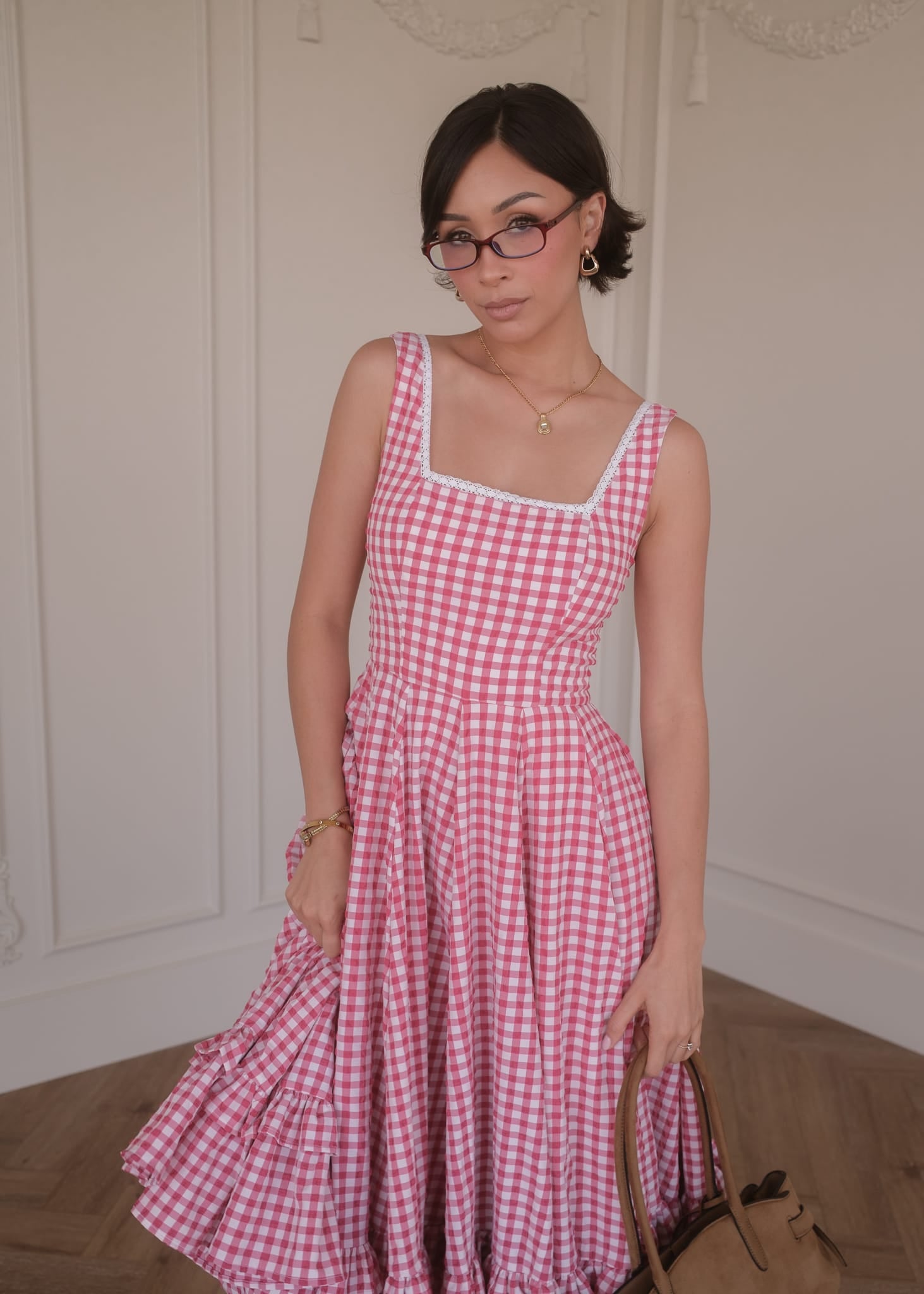 chic size inclusive model wearing JessaKae Daze Dress Red Gingham Dresses
