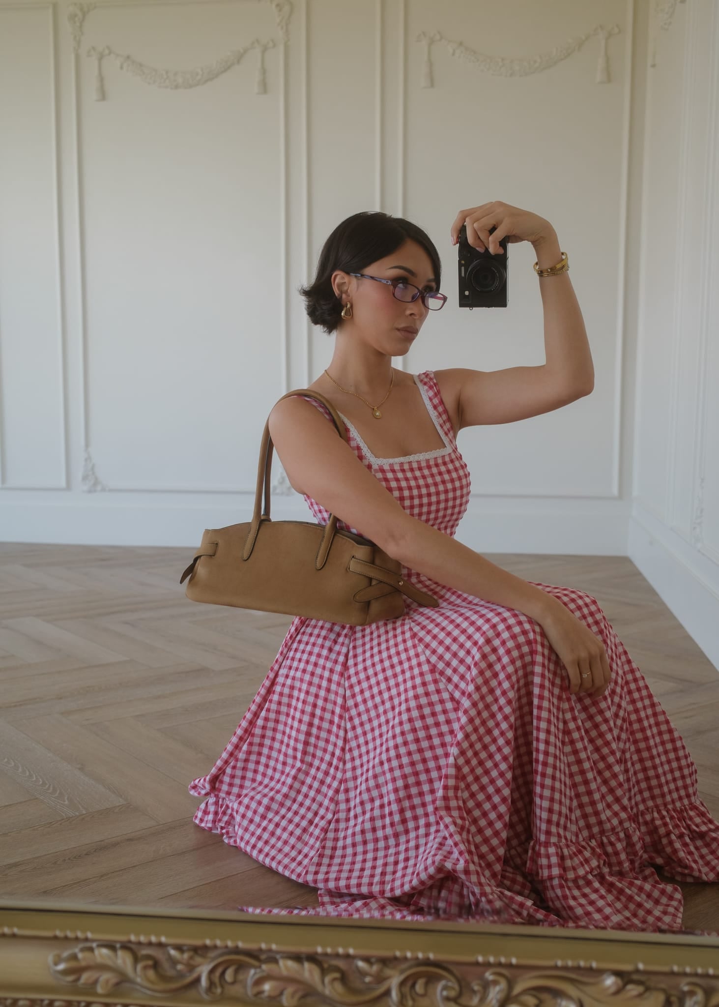 chic size inclusive model wearing JessaKae Daze Dress Red Gingham Dresses