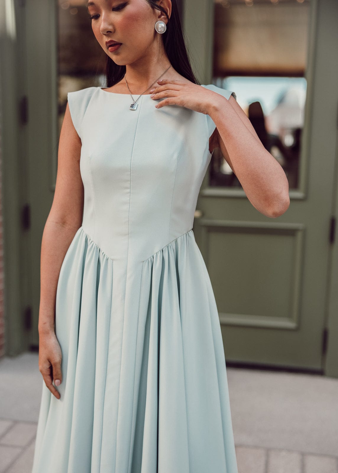 chic size inclusive model wearing JessaKae Diana Dress