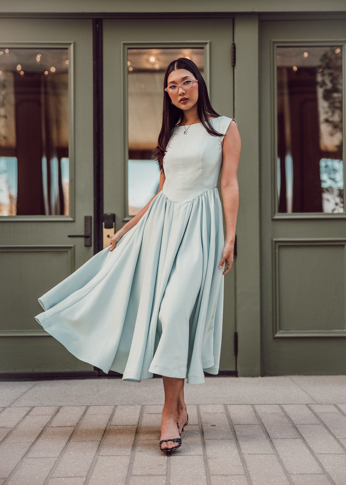 chic size inclusive model wearing JessaKae Diana Dress