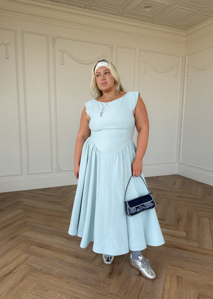 chic size inclusive model wearing JessaKae Diana Drop Waist Keyhole Back Dress - Light Blue Dresses