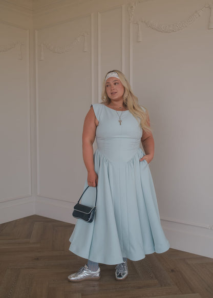 chic size inclusive model wearing JessaKae Diana Drop Waist Keyhole Back Dress - Light Blue Dresses