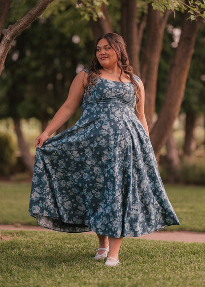 chic size inclusive model wearing JessaKae Dolly Dress