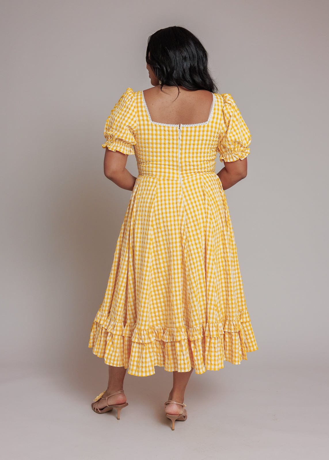 chic size inclusive model wearing JessaKae Dorothy Dress Dresses