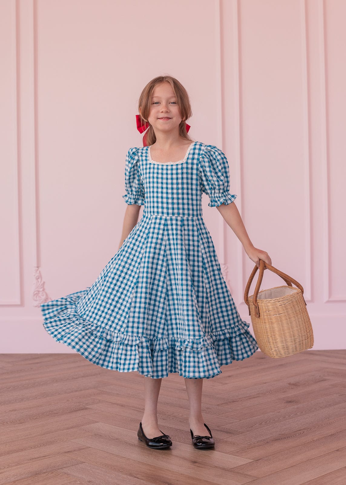 chic size inclusive model wearing JessaKae Dorothy Girls Dress
