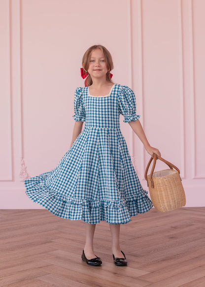 chic size inclusive model wearing JessaKae Dorothy Girls Dress