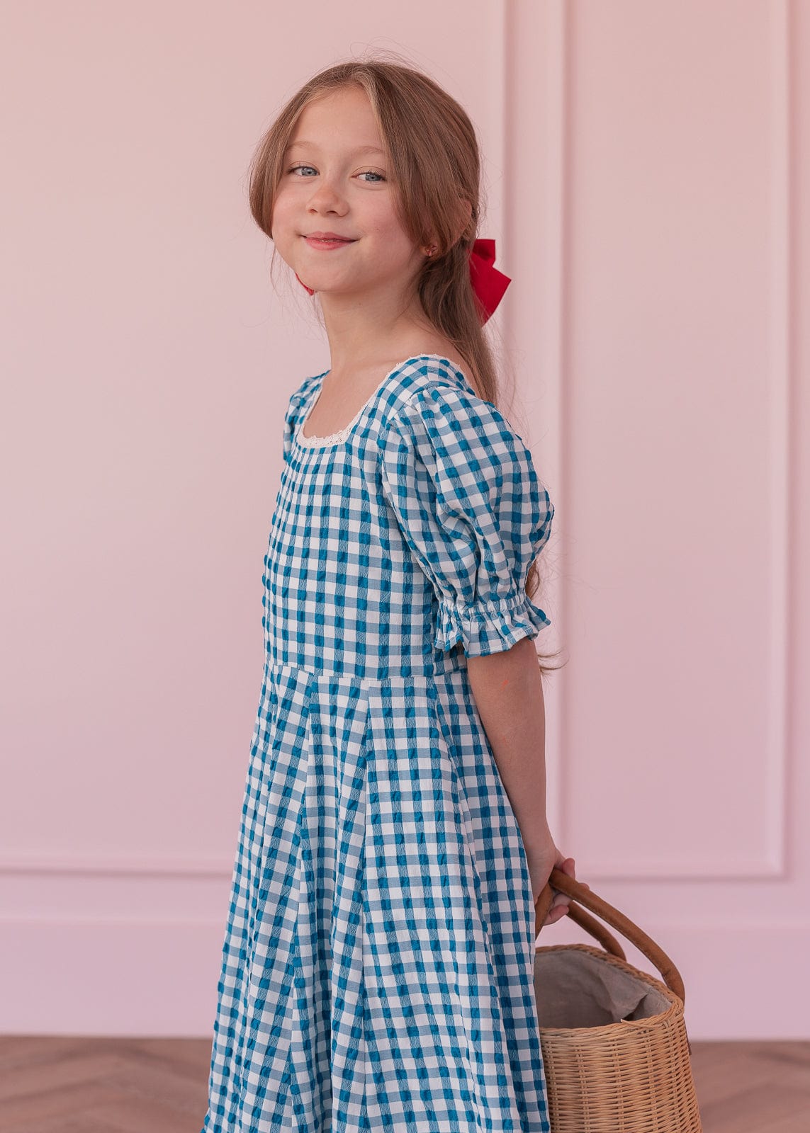 chic size inclusive model wearing JessaKae Dorothy Girls Dress