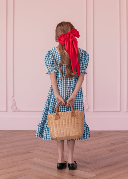 chic size inclusive model wearing JessaKae Dorothy Girls Dress