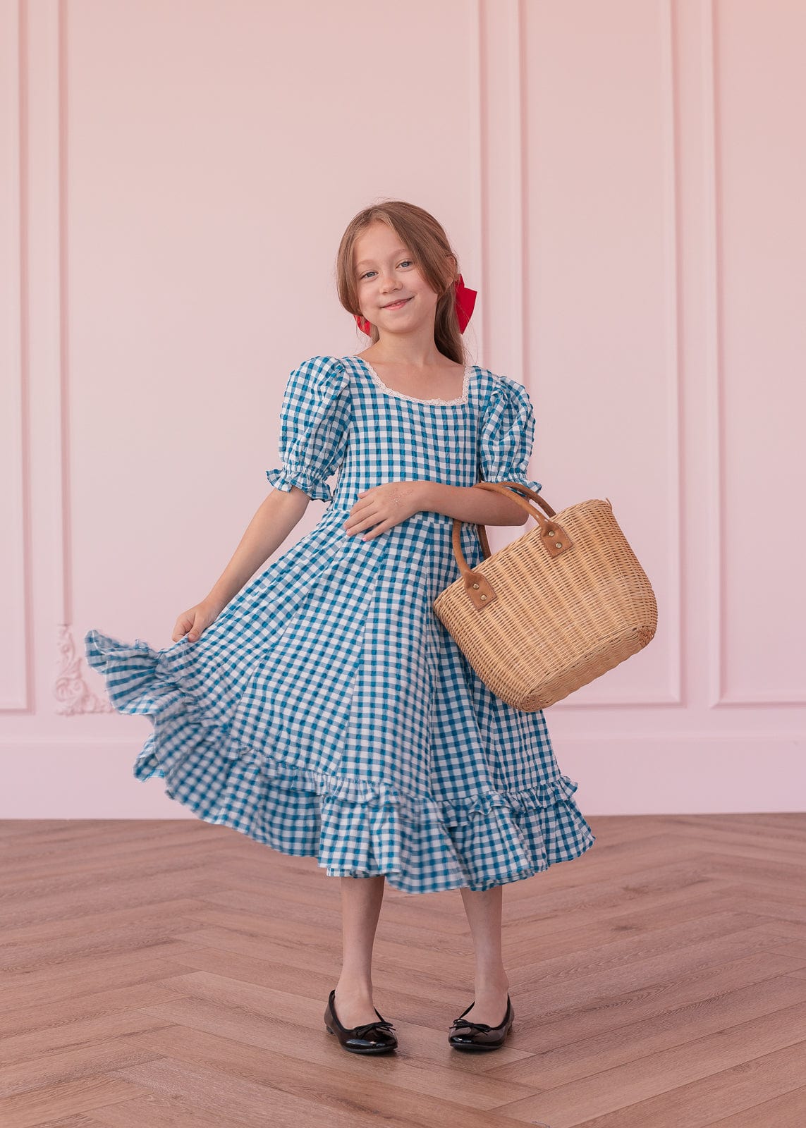 chic size inclusive model wearing JessaKae Dorothy Girls Dress