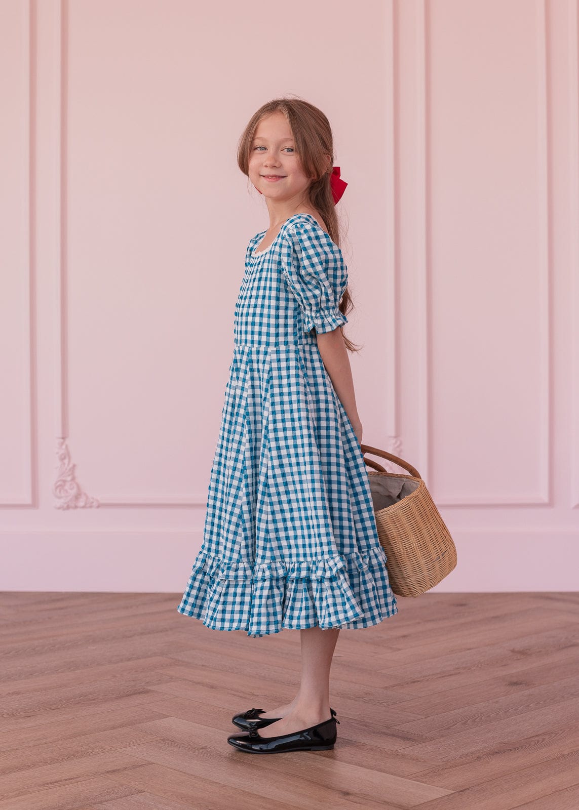 chic size inclusive model wearing JessaKae Dorothy Girls Dress