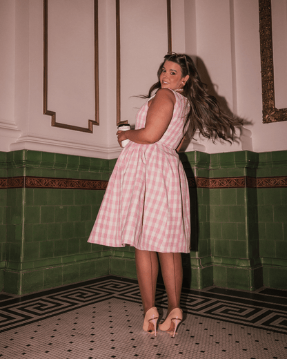 chic size inclusive model wearing JessaKae Elle Dress