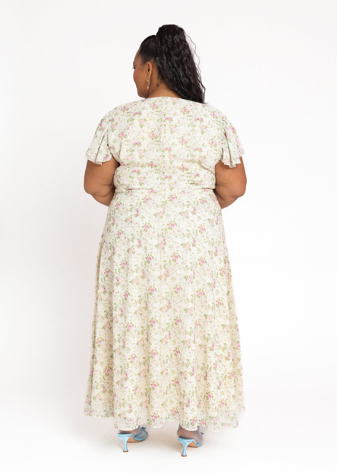 chic size inclusive model wearing JessaKae Elodie A-line Floral Midi Dress - Cream