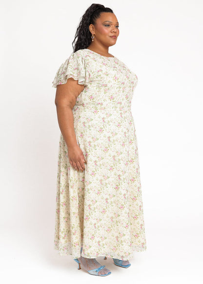 chic size inclusive model wearing JessaKae Elodie A-line Floral Midi Dress - Cream