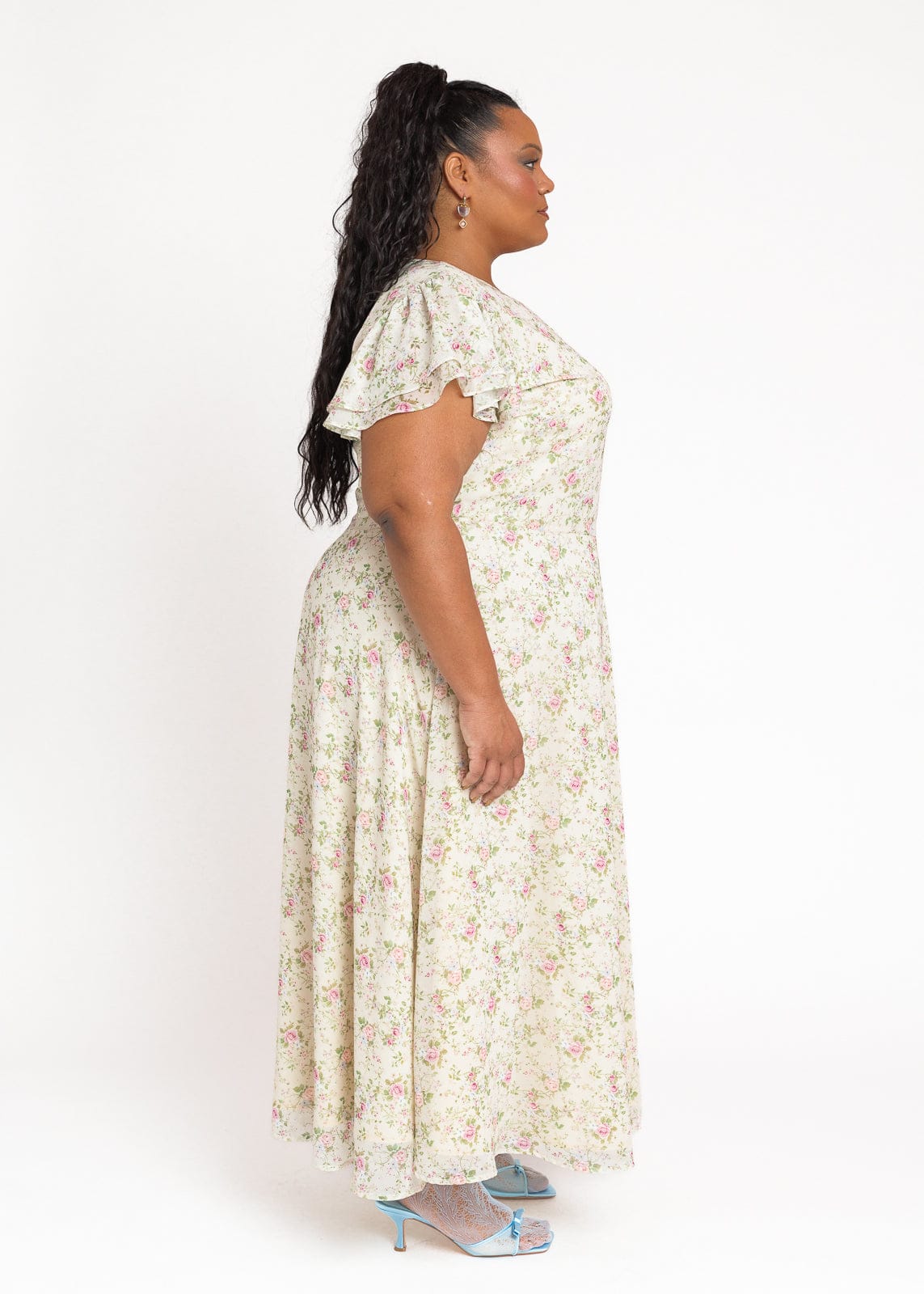 chic size inclusive model wearing JessaKae Elodie A-line Floral Midi Dress - Cream