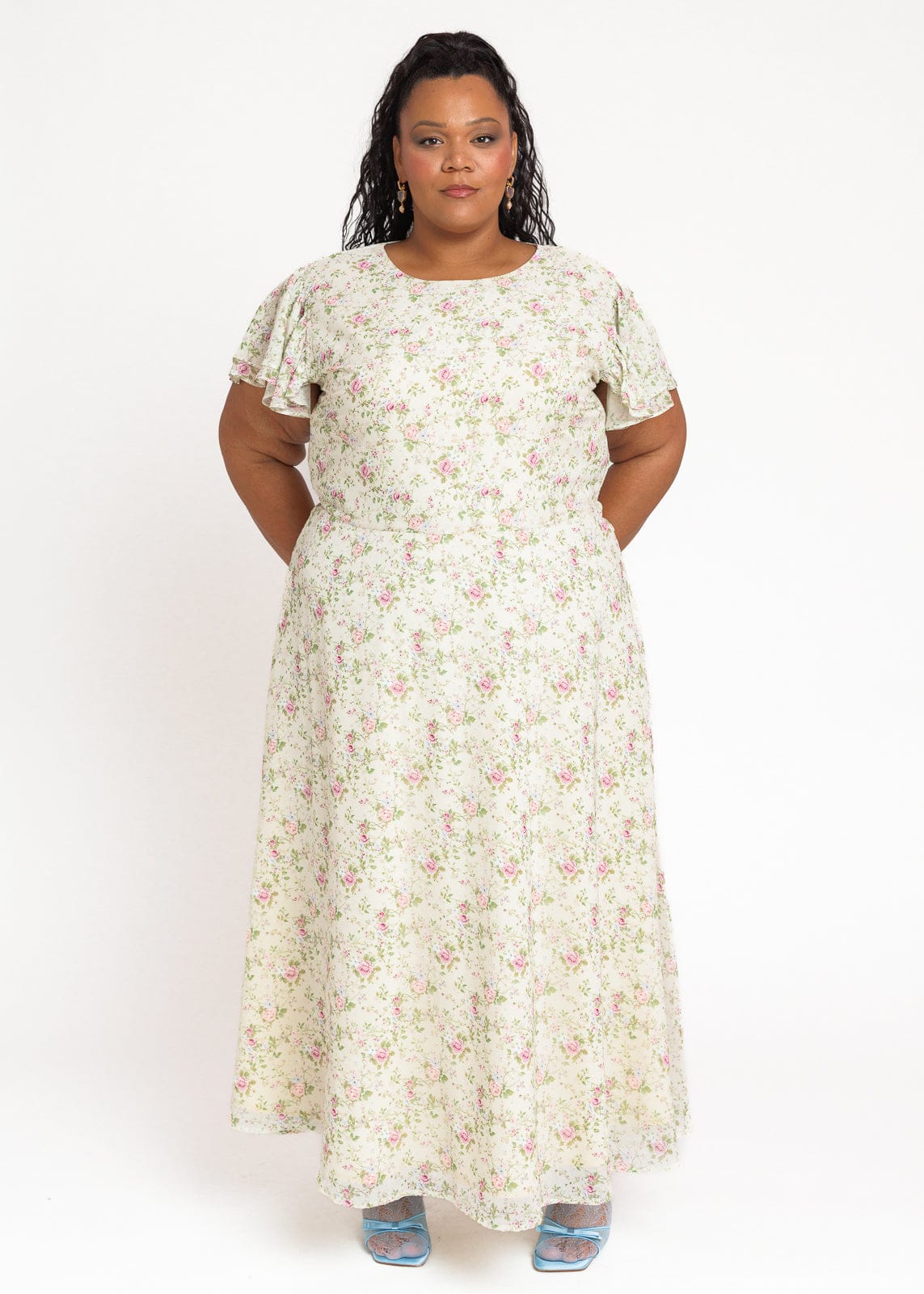 chic size inclusive model wearing JessaKae Elodie A-line Floral Midi Dress - Cream