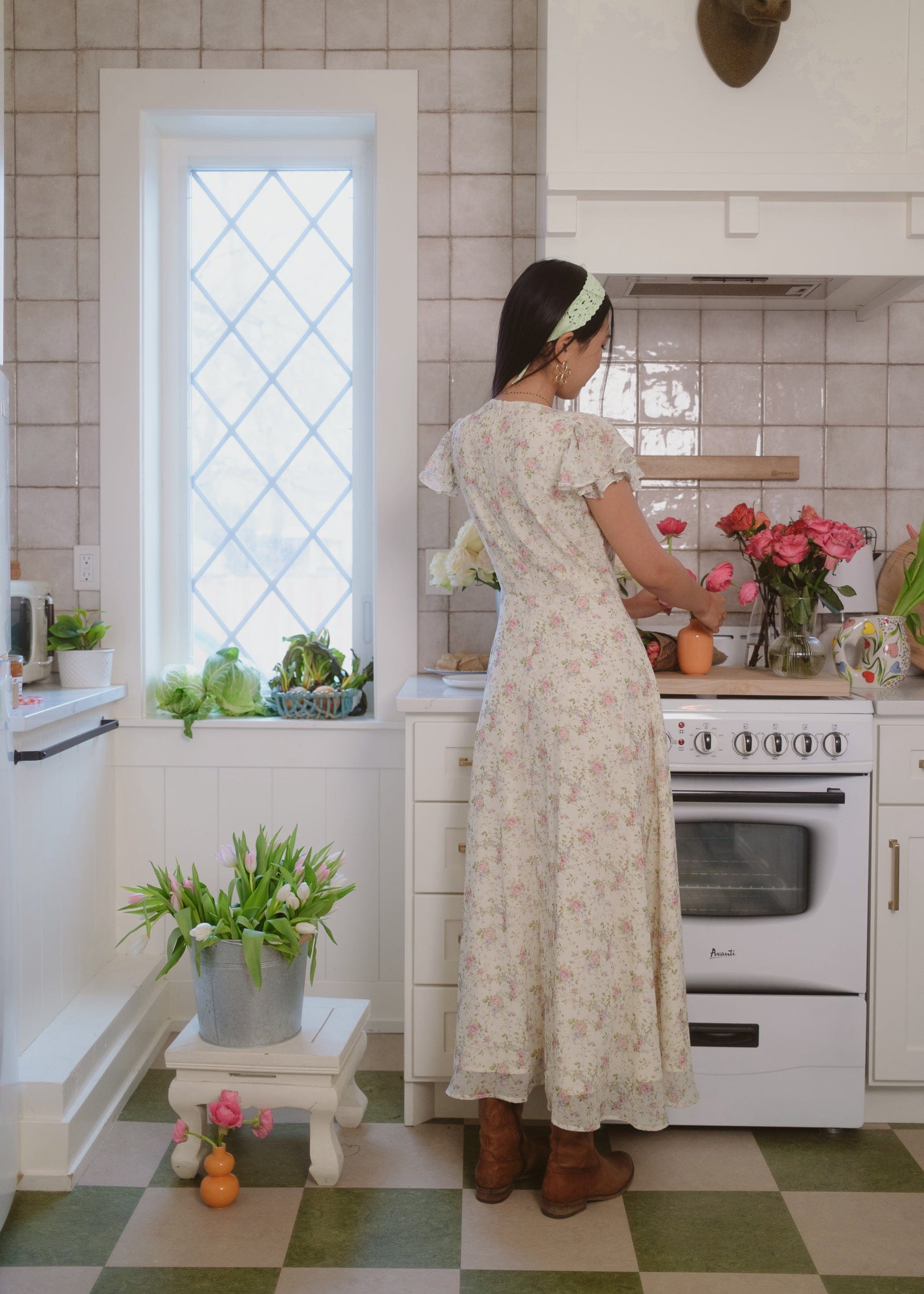 chic size inclusive model wearing JessaKae Elodie A-line Floral Midi Dress - Cream Dresses