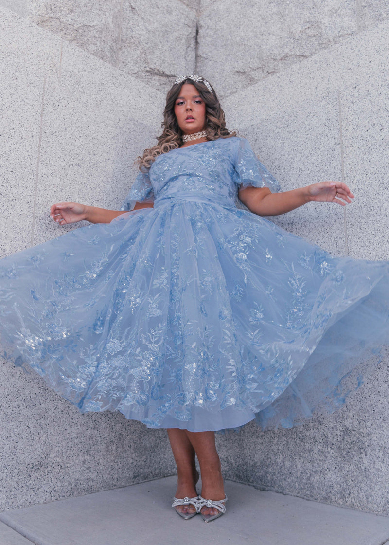 chic size inclusive model wearing JessaKae Elsa Dress Dresses