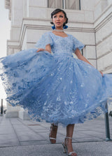 chic size inclusive model wearing JessaKae Elsa Dress Blue / XXS Dresses
