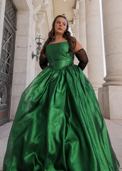 chic size inclusive model wearing JessaKae Emerald Dress