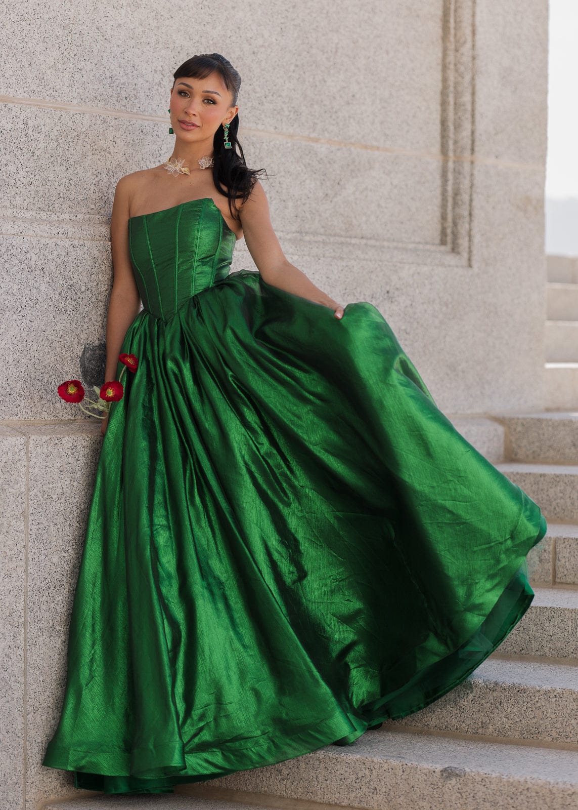chic size inclusive model wearing JessaKae Emerald Dress