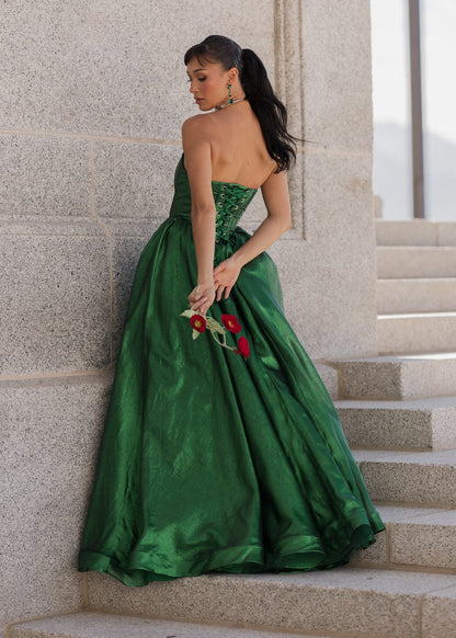 chic size inclusive model wearing JessaKae Emerald Dress