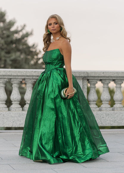 chic size inclusive model wearing JessaKae Emerald Dress