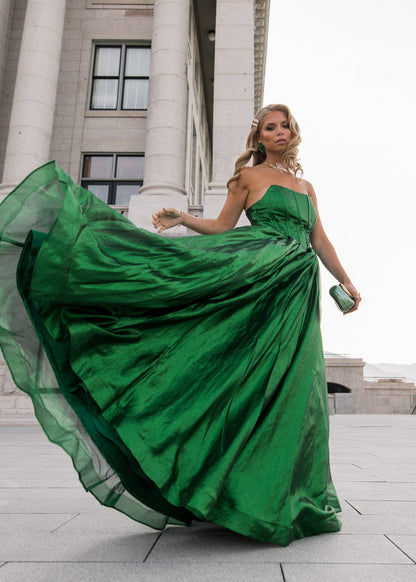 chic size inclusive model wearing JessaKae Emerald Dress