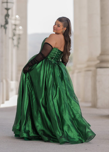 chic size inclusive model wearing JessaKae Emerald Dress