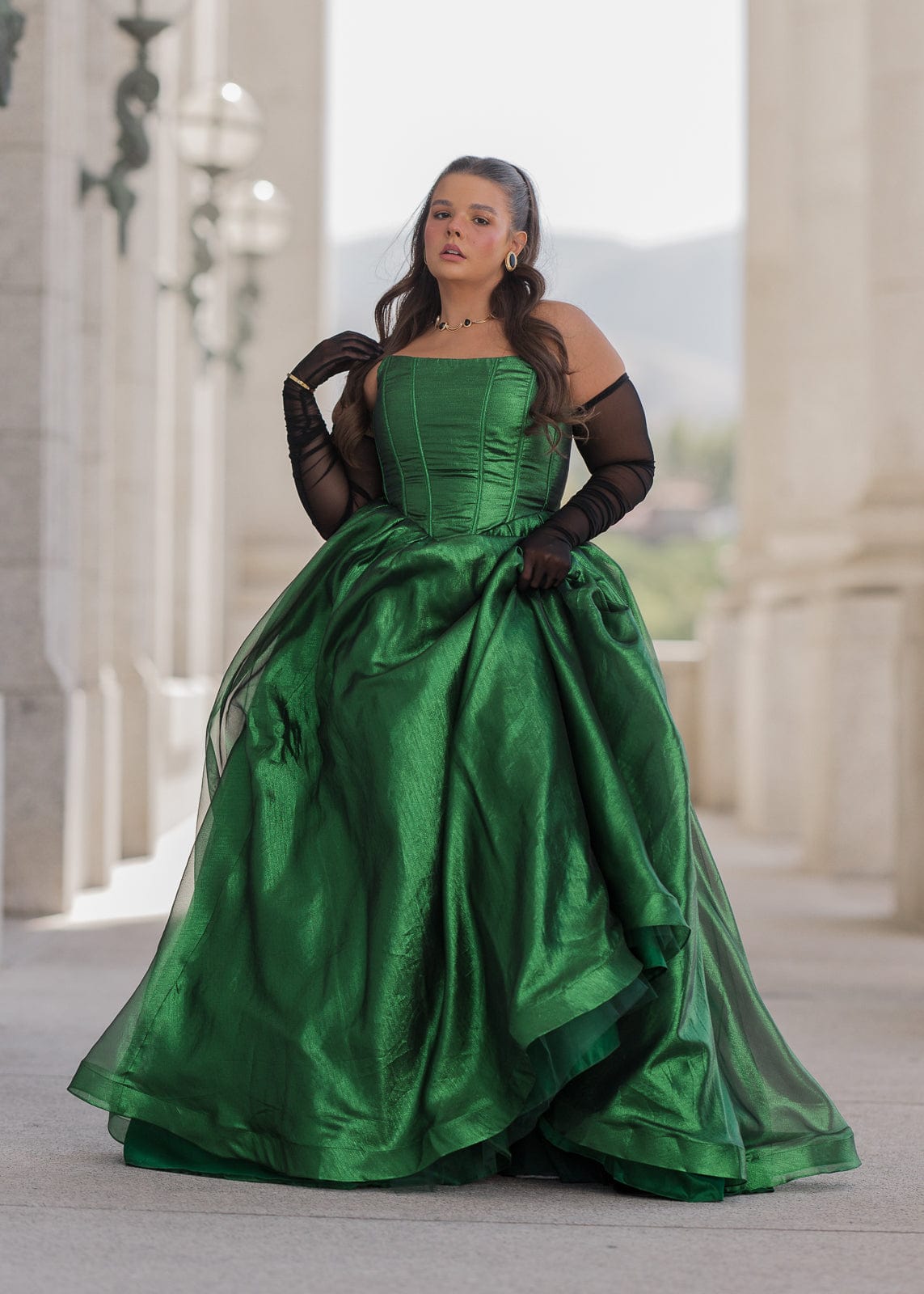chic size inclusive model wearing JessaKae Emerald Dress