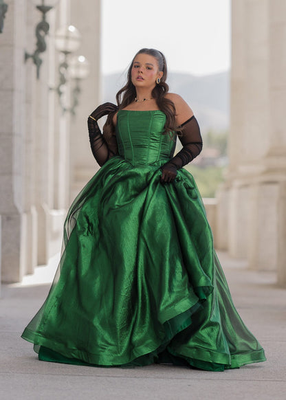 chic size inclusive model wearing JessaKae Emerald Dress
