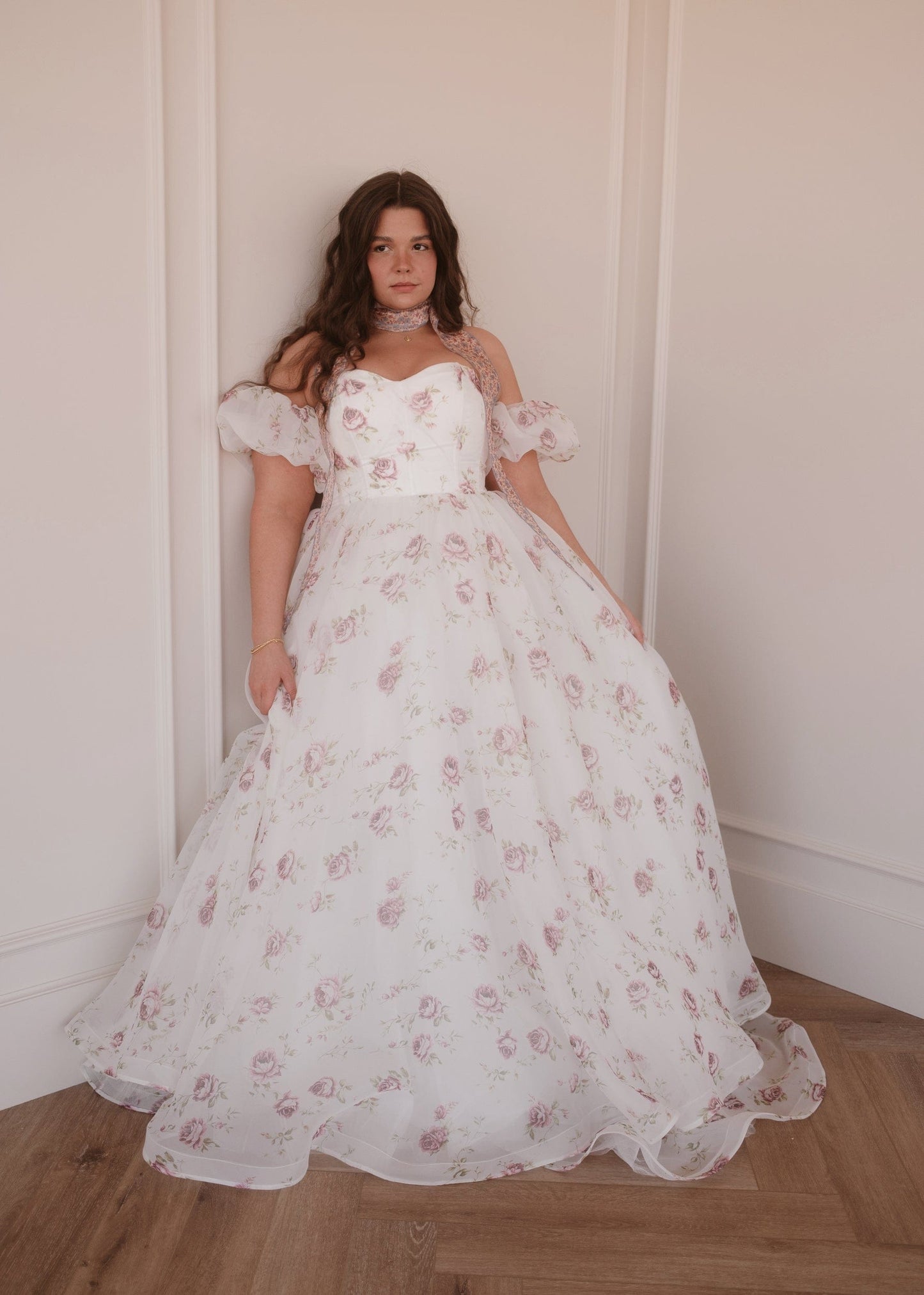 chic size inclusive model wearing JessaKae Evangeline Dress