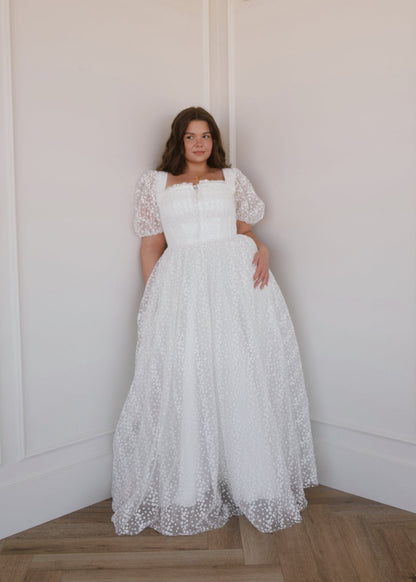 chic size inclusive model wearing JessaKae Everbloom Dress - Maxi White / 12