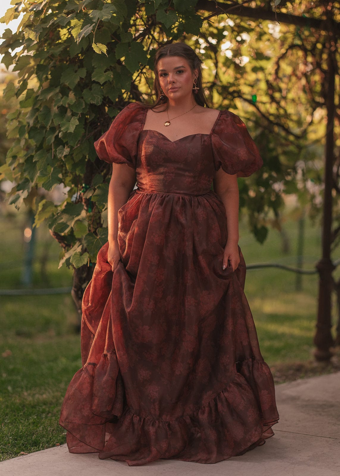 chic size inclusive model wearing JessaKae Fable Dress