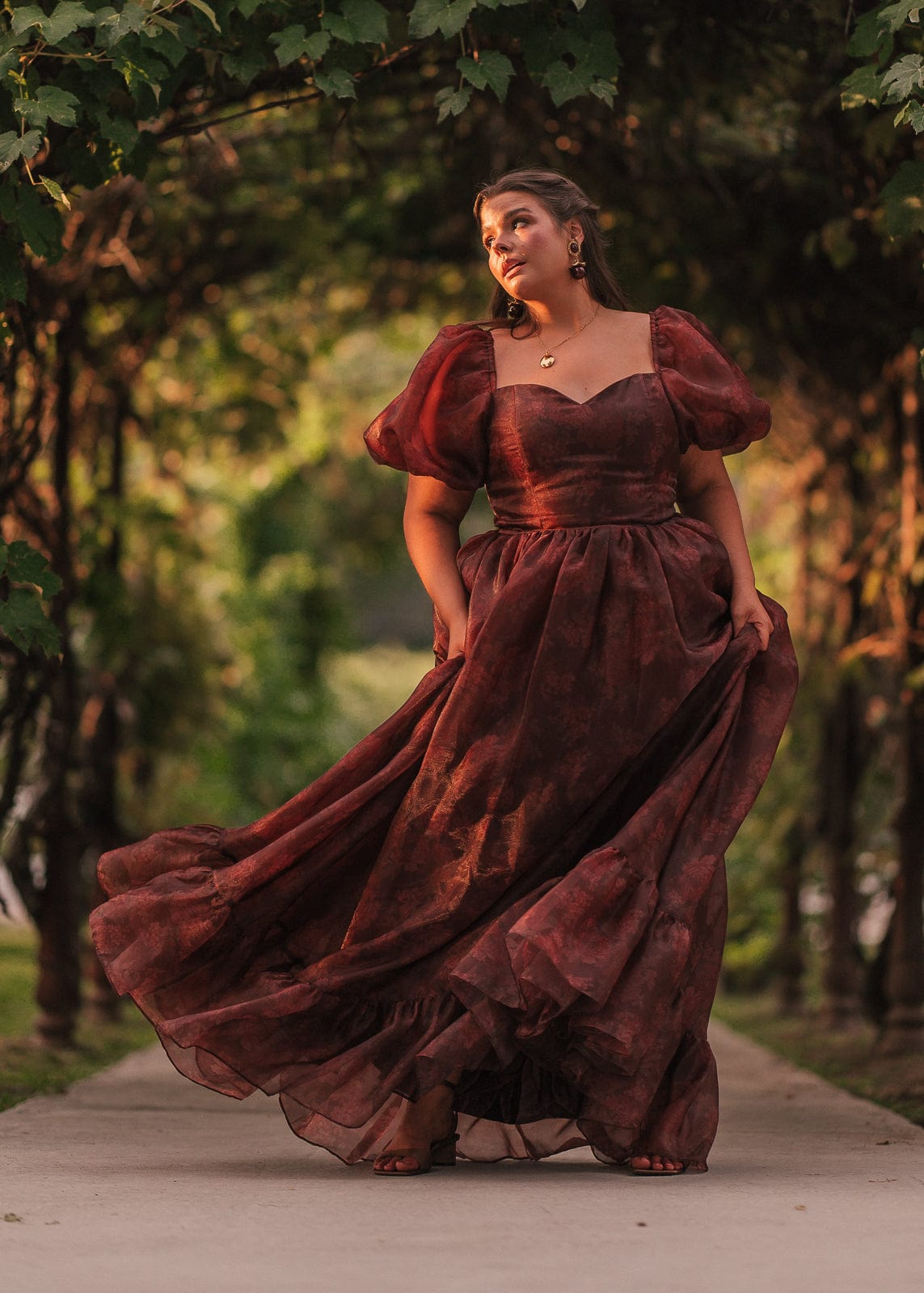 chic size inclusive model wearing JessaKae Fable Dress