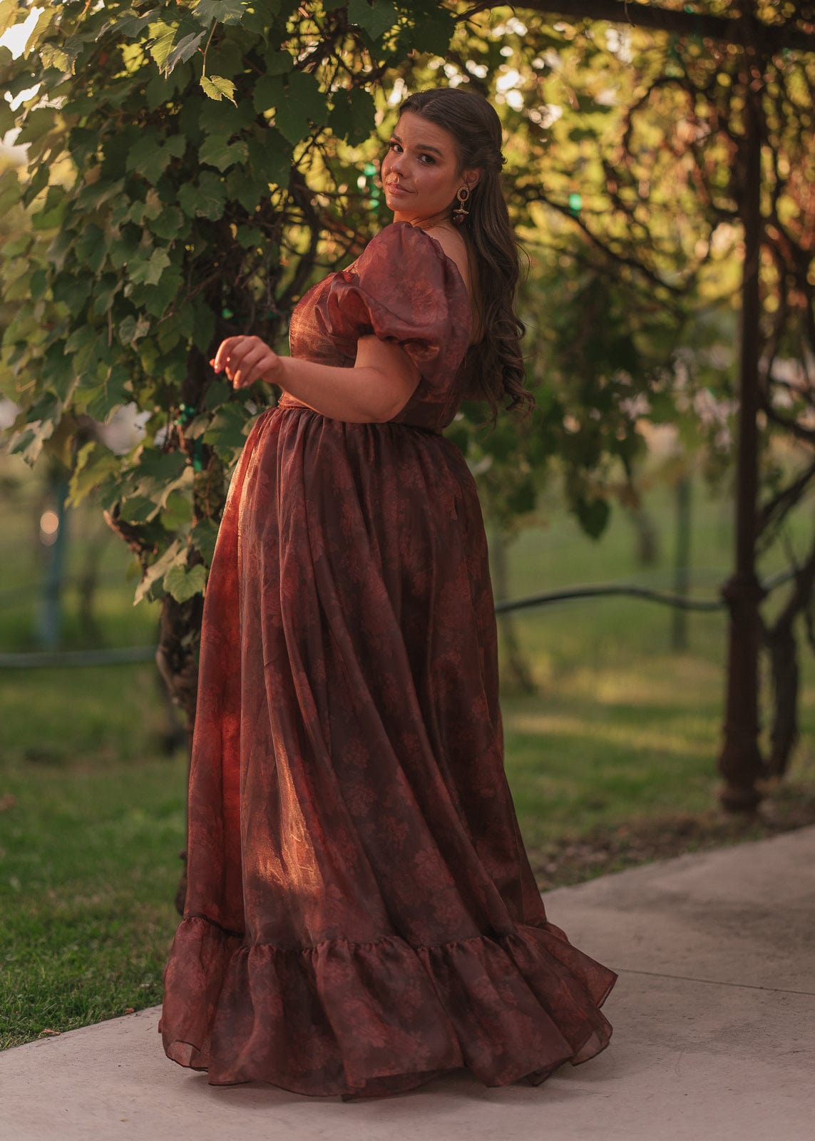 chic size inclusive model wearing JessaKae Fable Dress