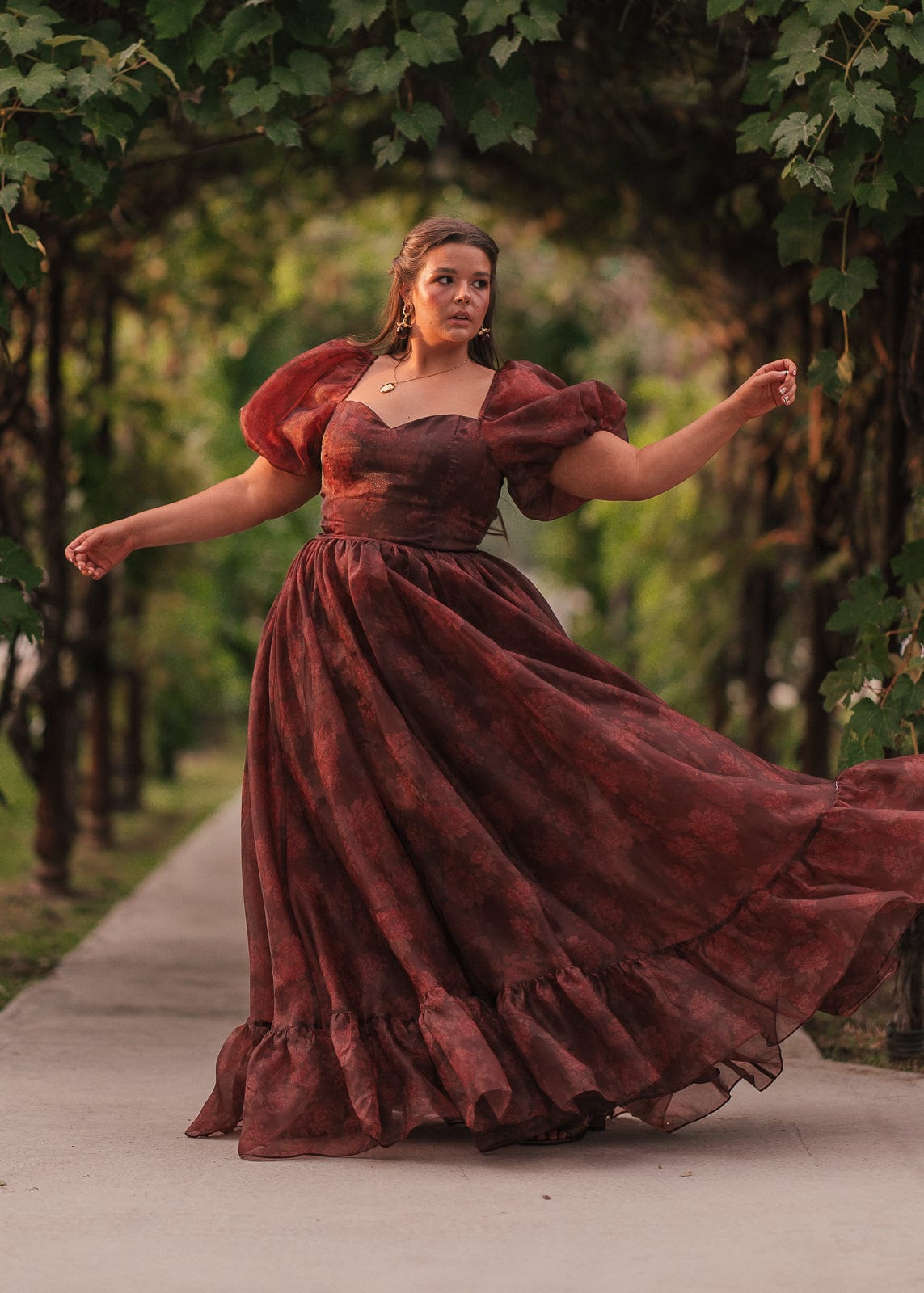 chic size inclusive model wearing JessaKae Fable Dress