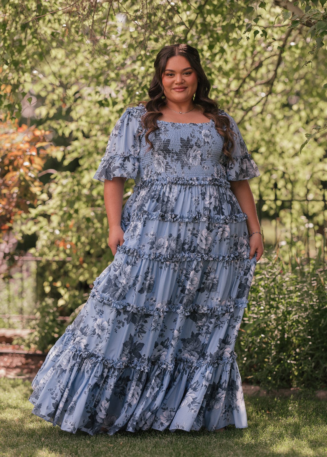 chic size inclusive model wearing JessaKae Faeryn Dress