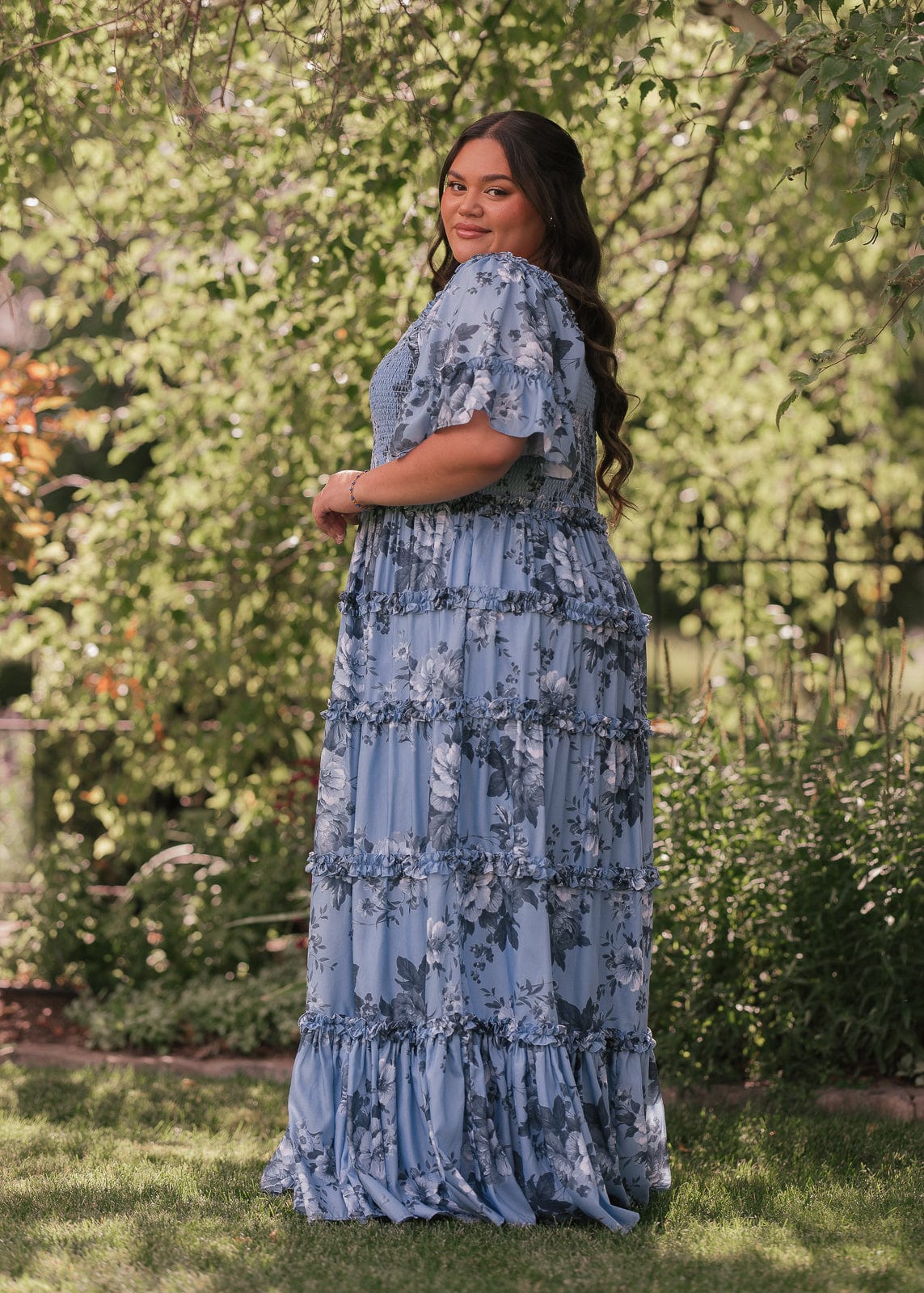 chic size inclusive model wearing JessaKae Faeryn Dress