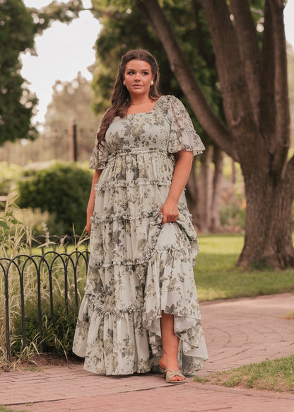 chic size inclusive model wearing JessaKae Faeryn Dress