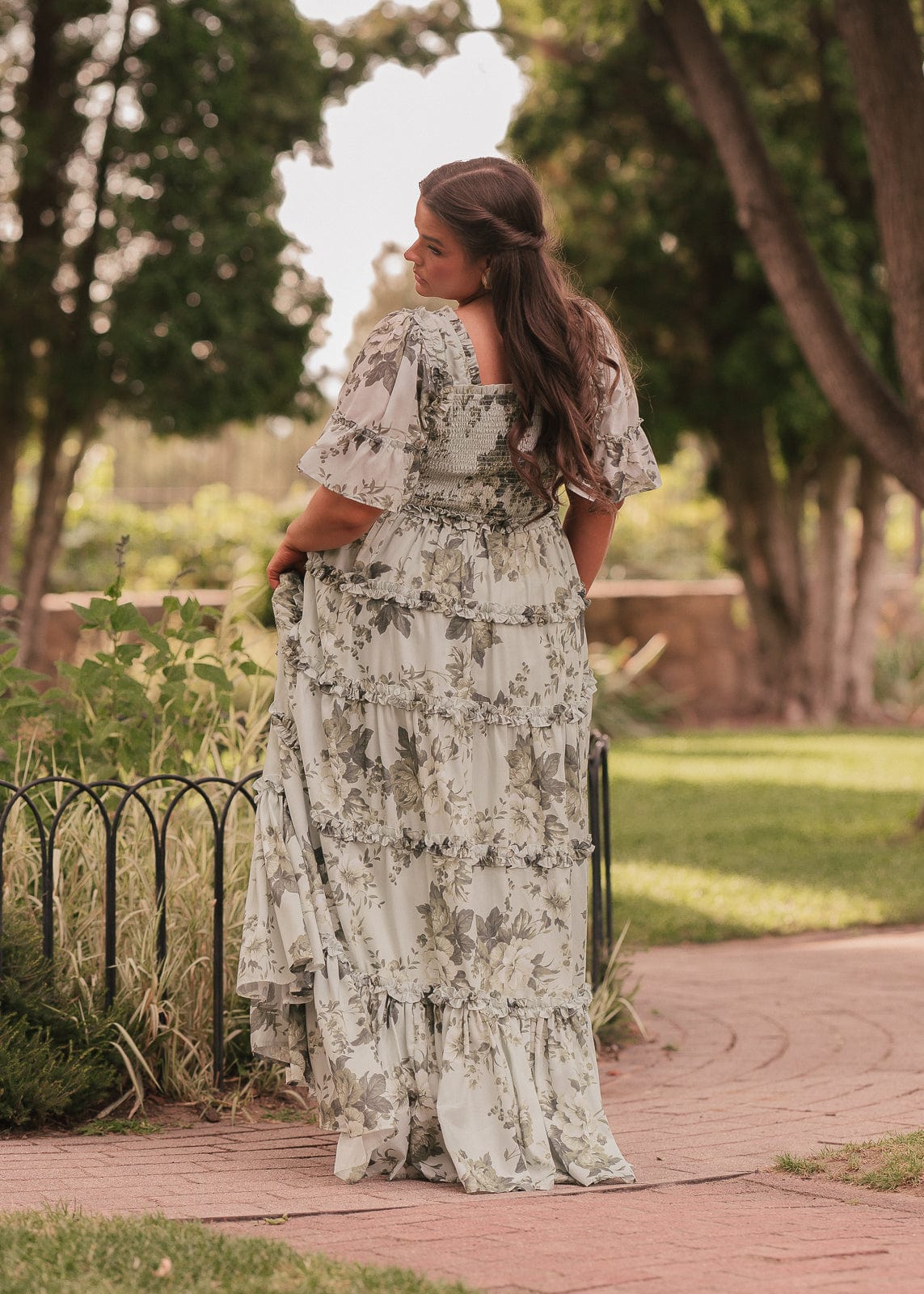 chic size inclusive model wearing JessaKae Faeryn Dress