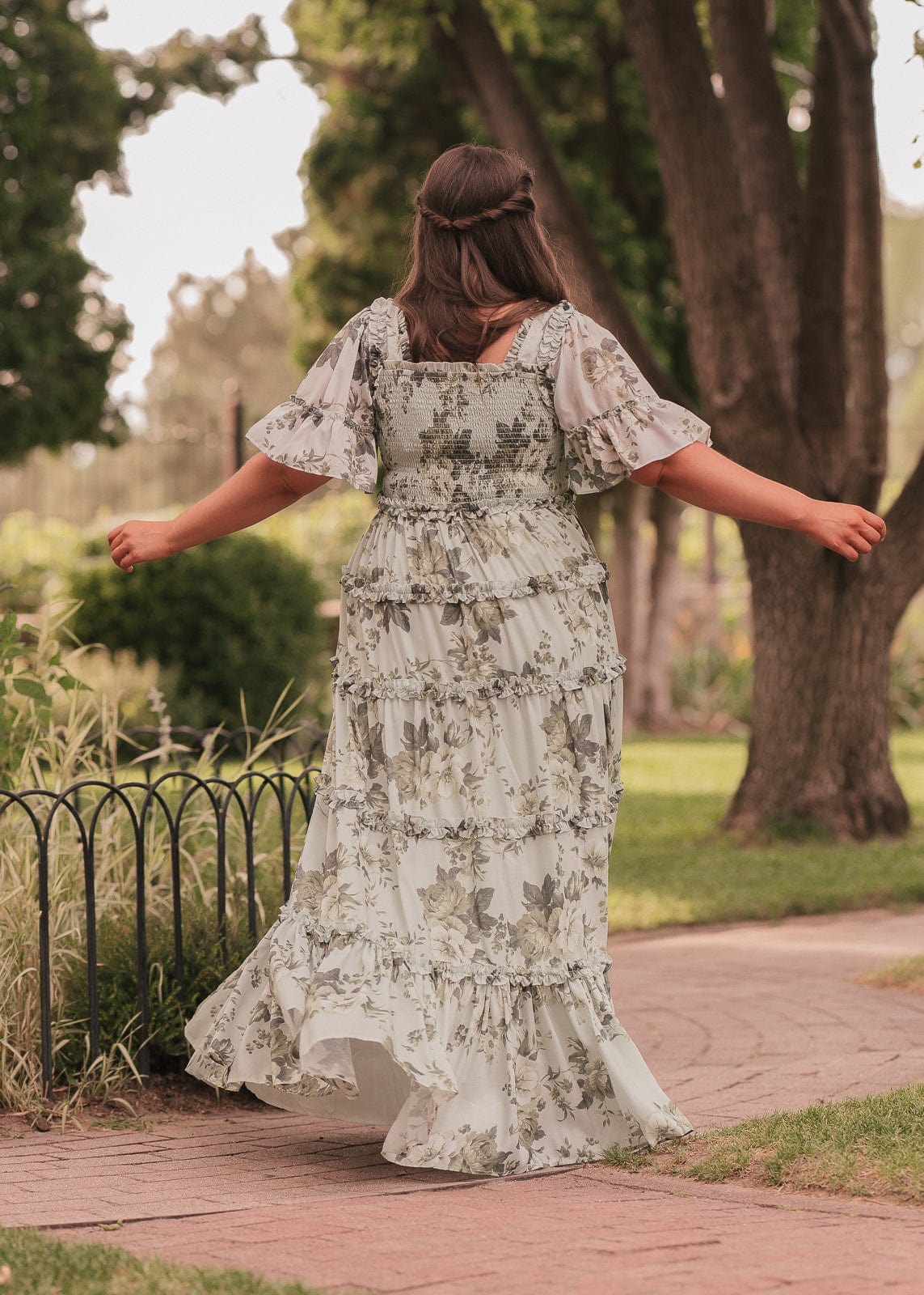 chic size inclusive model wearing JessaKae Faeryn Dress