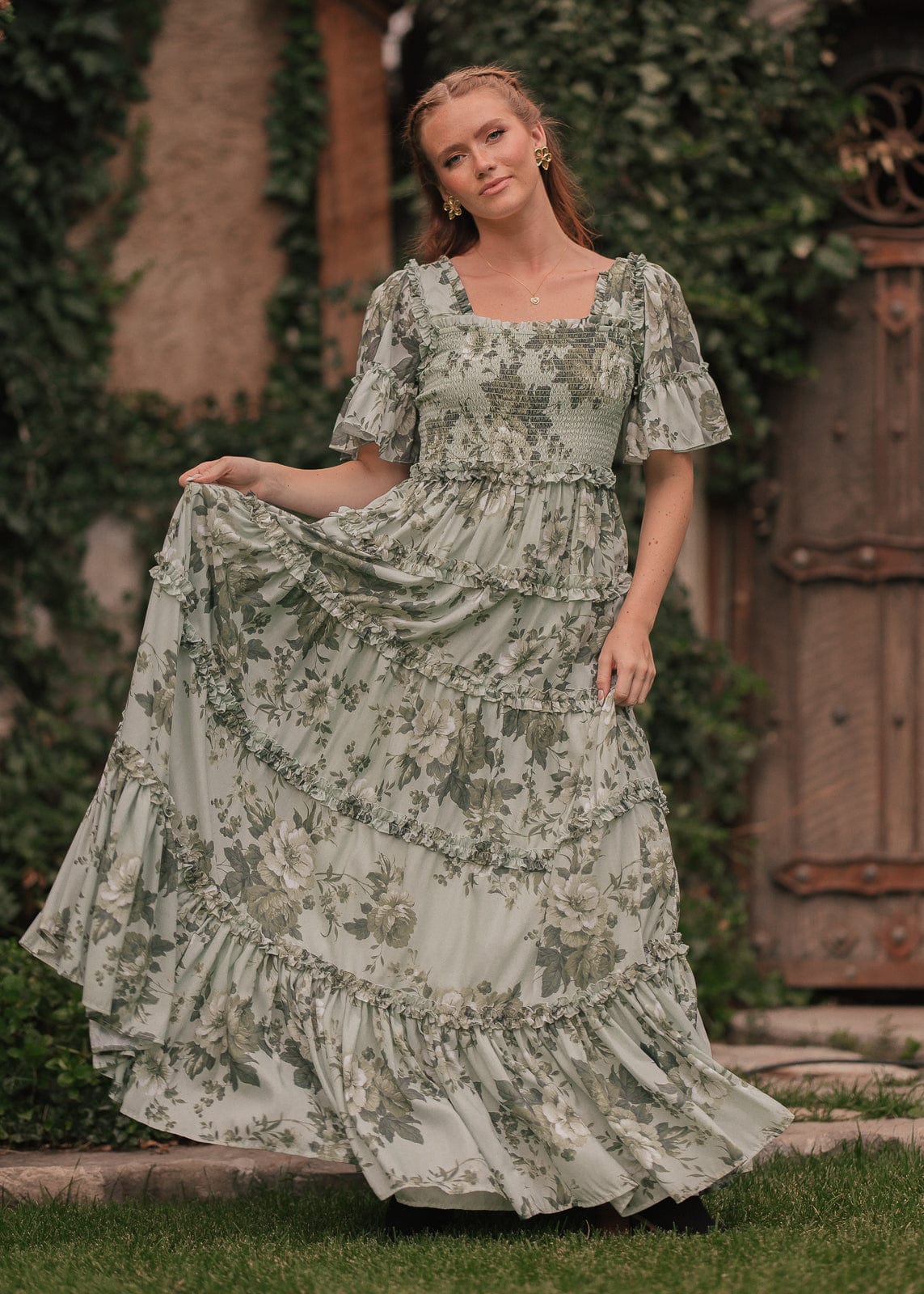 chic size inclusive model wearing JessaKae Faeryn Dress